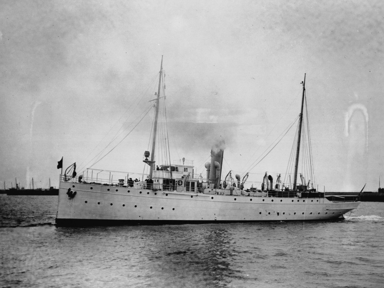 A black and white image of a military ship.