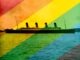 An image of a four funnel ocean liner superimposed against a rainbow