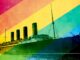 An image of a four funnel ocean liner superimposed against a rainbow